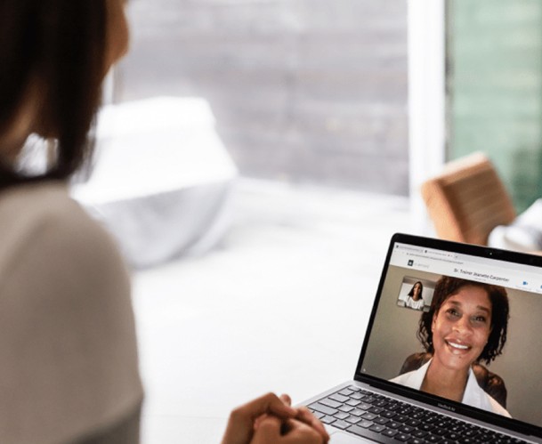 A distressed California patient speaking with an emergency virtual psychiatrist via video call.