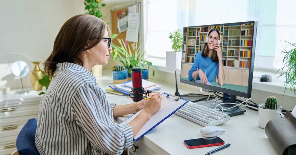 Woman in California using laptop for a telepsychiatry appointment from home