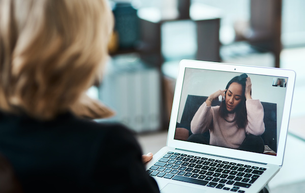 Military spouse in Sacramento speaking with an online psychiatrist covered by Tricare West.