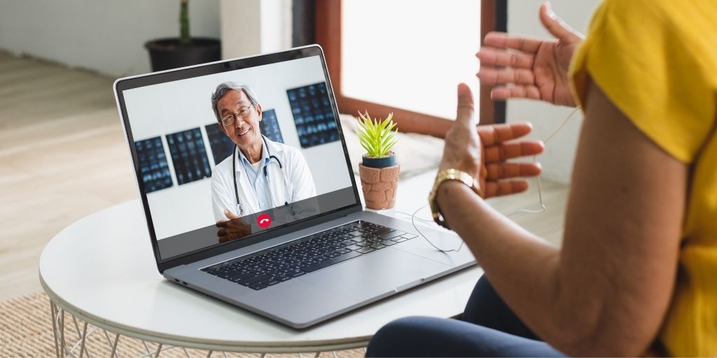 Adult in California speaking with an online psychiatrist via video call using Blue Shield of California coverage.