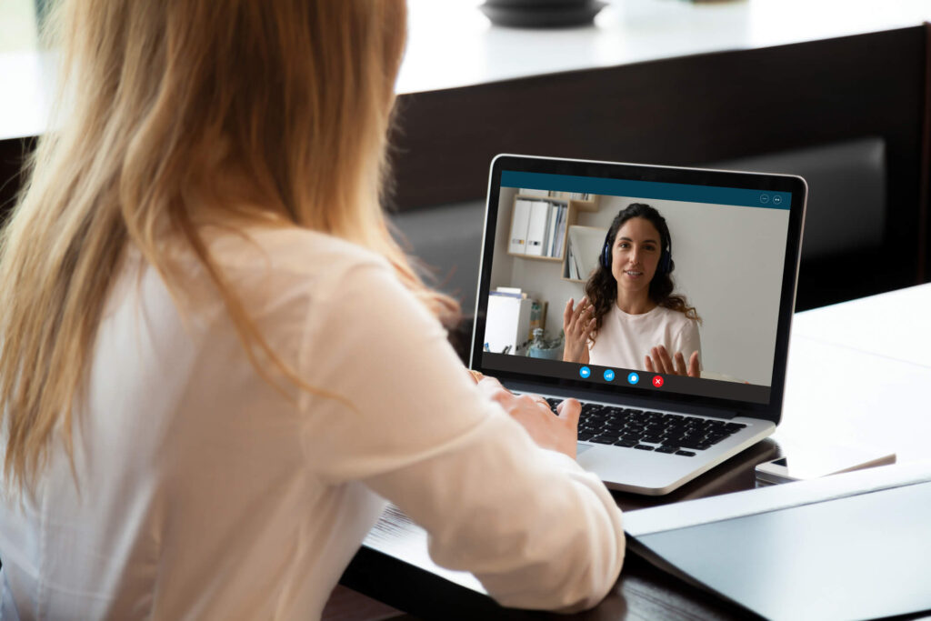 Person in San Jose in online depression therapy session via laptop