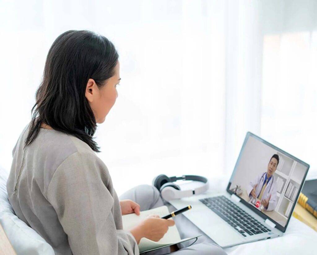 Patient in Chula Vista having an online psychiatric evaluation via laptop