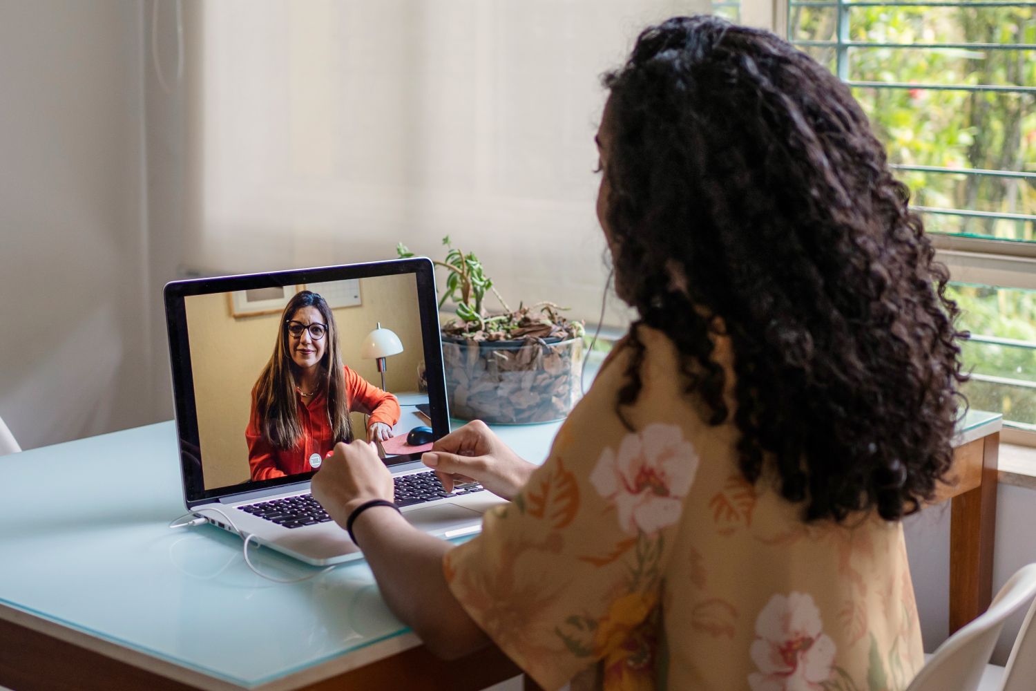 Salinas patient in a virtual psychiatry session on a laptop